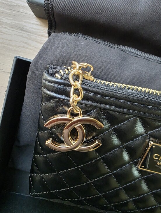 CHANEL Handbags - Chanel Black Embroidered Logo Travel Pouch